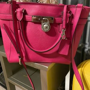 Beautiful  like new medium size handbag with shoulder strap.